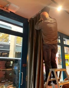 Professional curtain fixing service Dubai