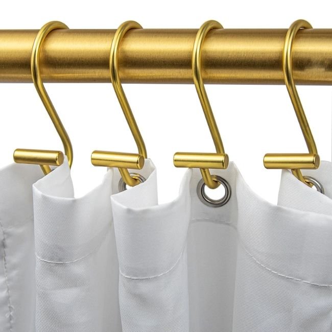 Stylish gold curtain hooks in Dubai