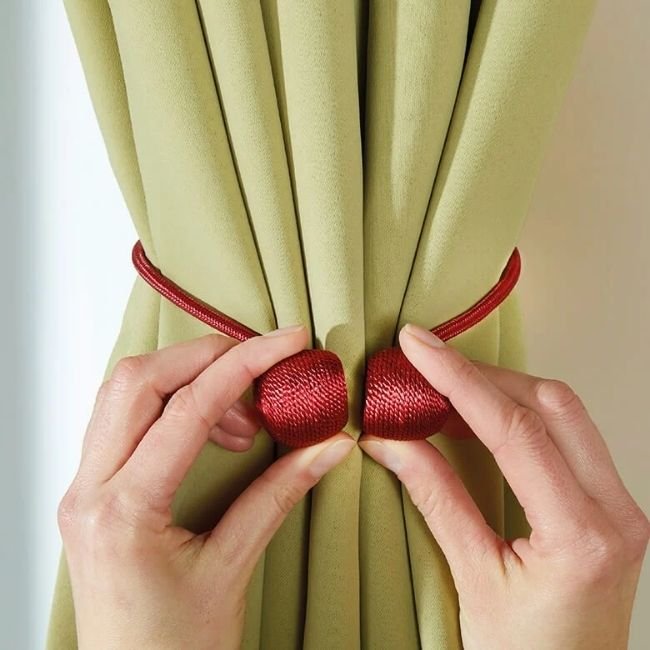 Magnetic curtain tie-backs used in new setup