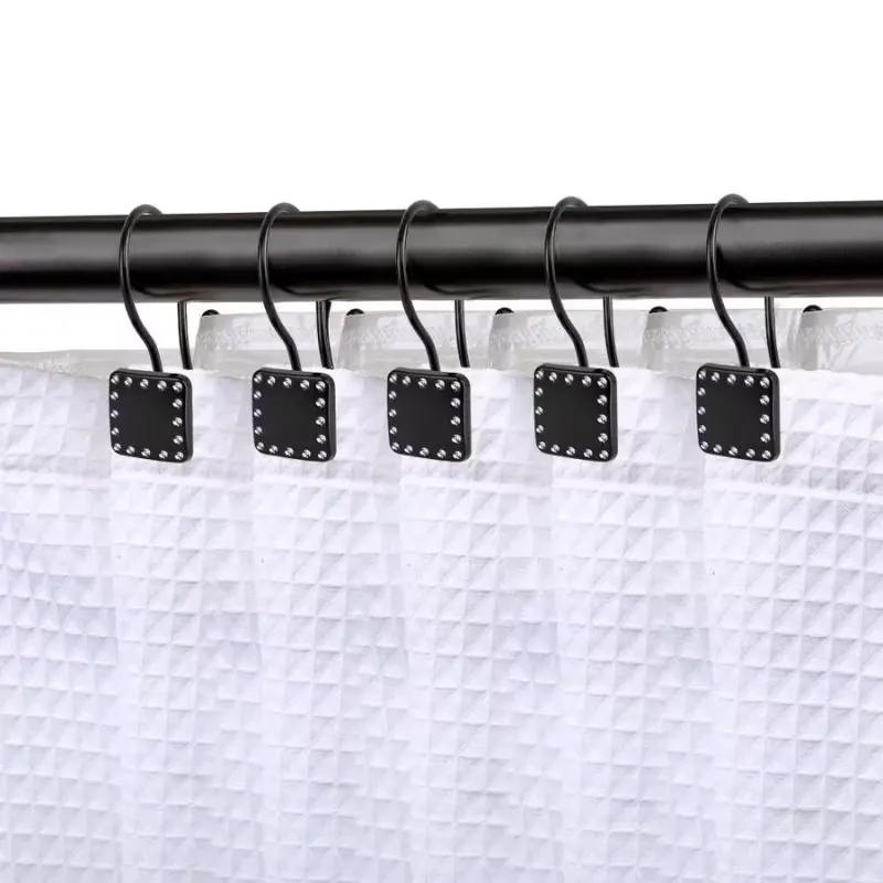 Durable hooks attached along curtain header